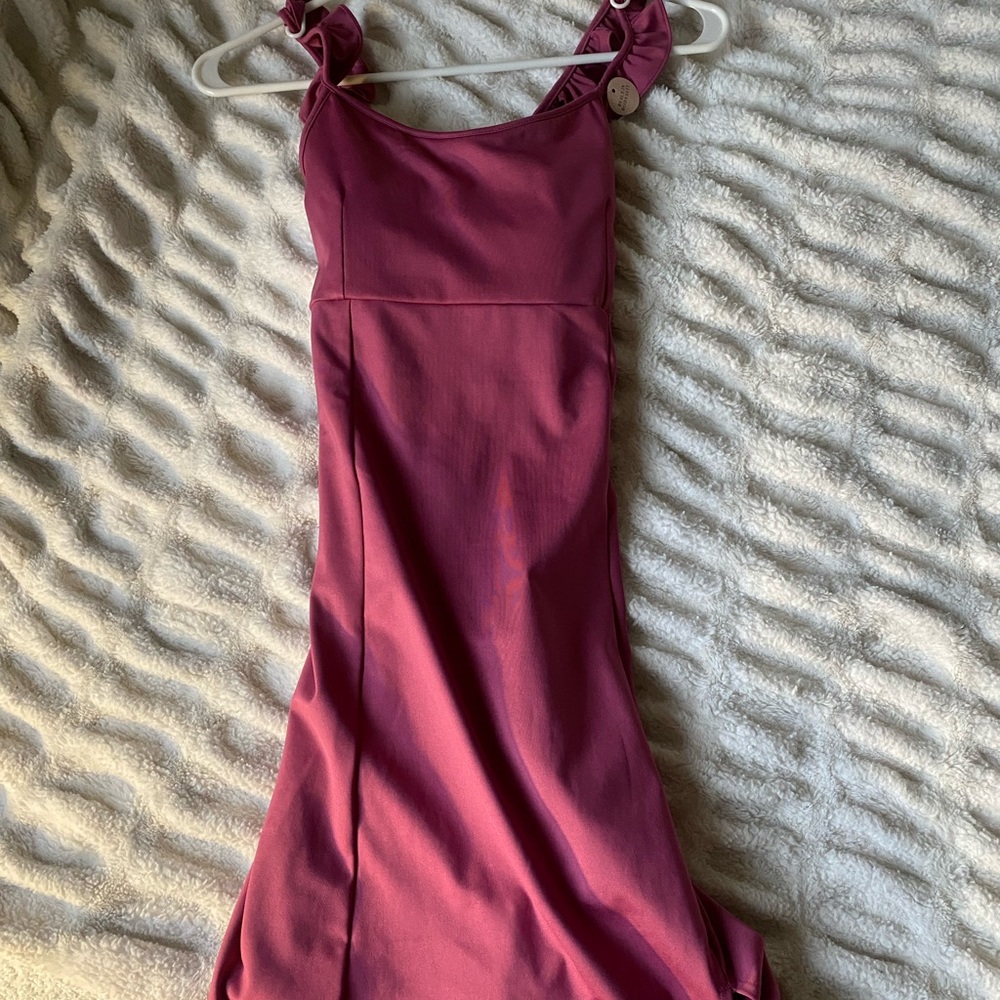 Women’s dress with built In body suit
